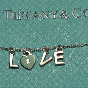 Tiffany & Co. Silver and Green Love Necklace